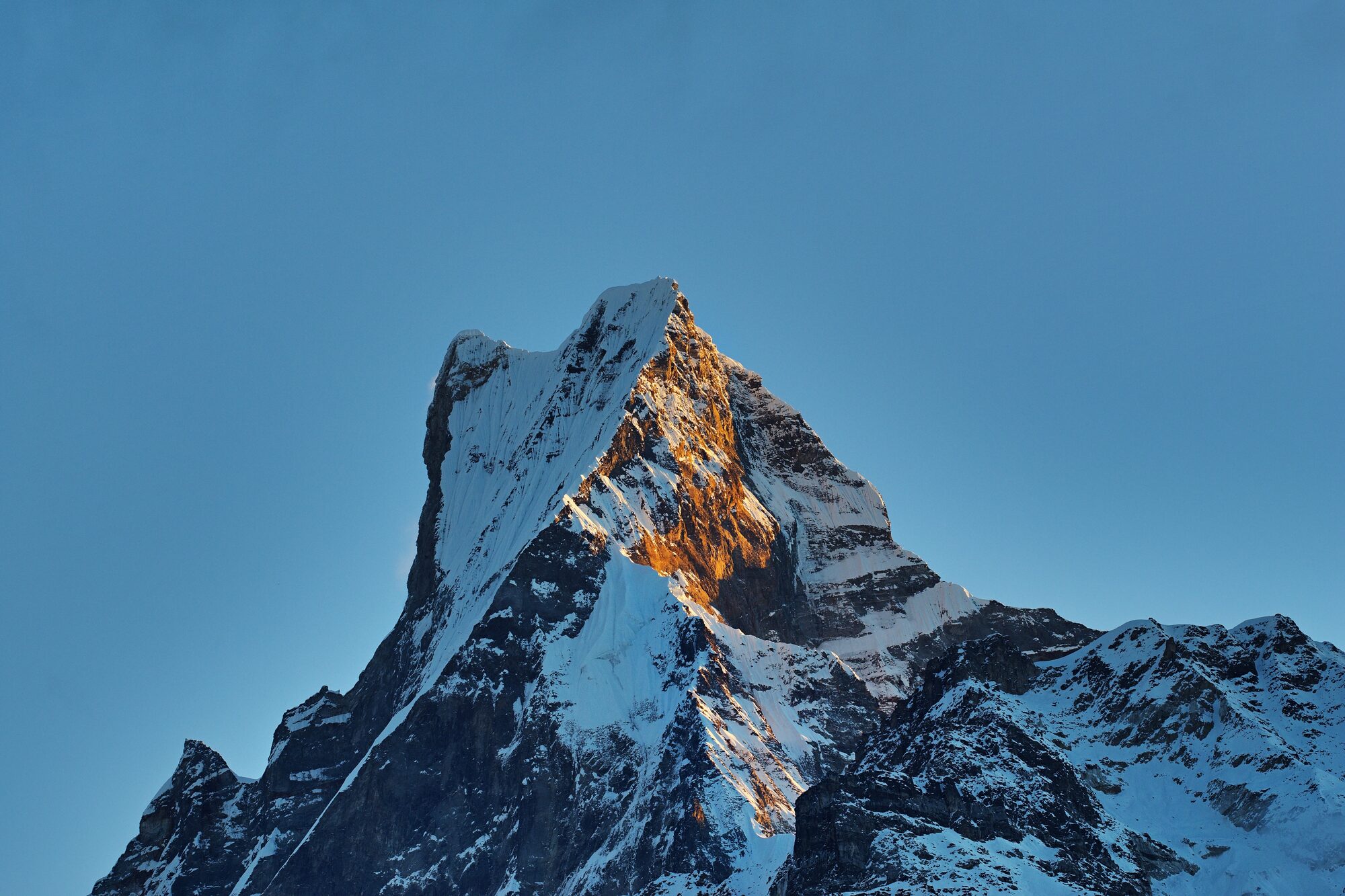 Snow capped mountain peak